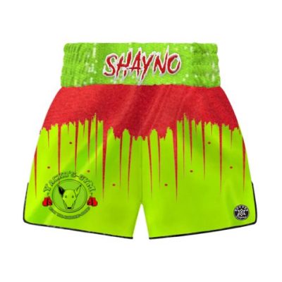 Shine Bright custom Muay Thai shorts with striking drip-effect pattern, wide legs, and side slits.