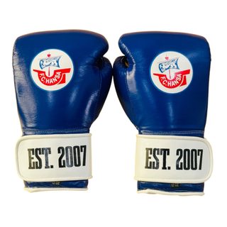 blue and white leather boxing gloves with glossy white strap and retro wrist branding