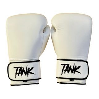 white leather boxing gloves with black trim, velcro strap, and Welsh flag accent