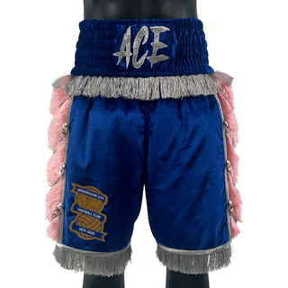 Custom blue boxing shorts with peach faux long fur style, silver tassels, silver chain and buttons, and crystal embellished on embroidered name