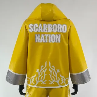 Custom boxing jacket in yellow leatherette with white metallic trim and crystals