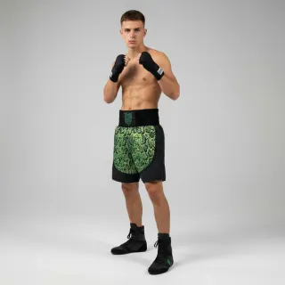 Custom boxing shorts in green snake shimmer print with black velvet waistband