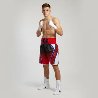 Custom boxing shorts in red and white satin with blue shimmer trims and red sequins