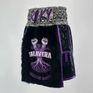 Custom boxing shorts in green high-shine satin with snake print waistband and flag detail