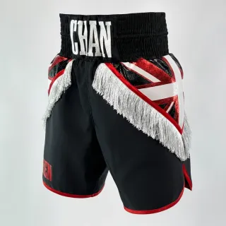 custom boxing shorts in black satin with Union Jack flag panel and white tassel trim