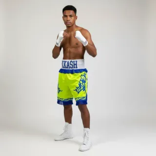custom made boxing shorts in neon yellow satin with blue tassels and embellishments