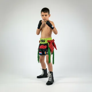 Custom Muay Thai shorts in black and neon green sequins with red ribbon and green tassels