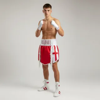 Custom gladiator boxing shorts in red and white matt satin with flag detail and tassels