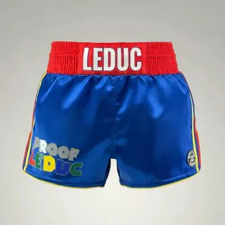 Custom Muay Thai shorts in blue glossy satin with red and yellow details and name waistband