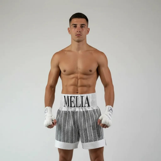 Custom boxing shorts in white satin with black print, quilted panels and crystal name waistband