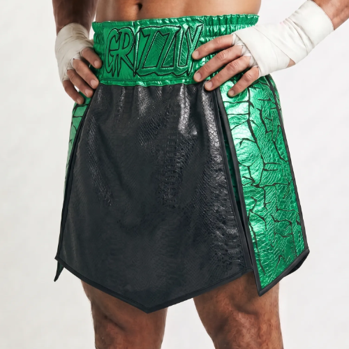 Thunder Gladiator custom gladiator boxing shorts with six-panel build and cracked side panels revealing a layered lava-style colour effect.