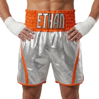 Custom boxing shorts in silver and orange metallic snake leatherette, with Touch Gloves design