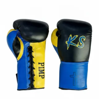 Black, blue, and yellow custom lace-up boxing gloves with flat wrist design, KS initials, cross detail, and contrast leather panels.